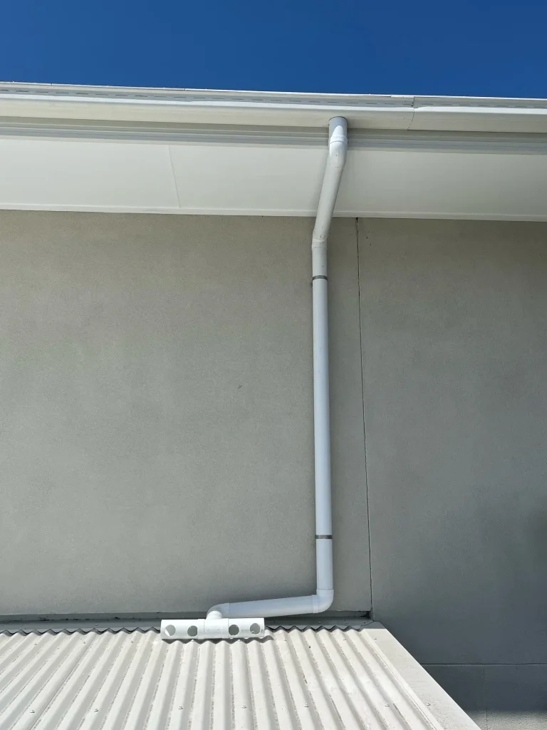 Stormwater downpipe and spreader installed by H1 Plumbing & Drainage