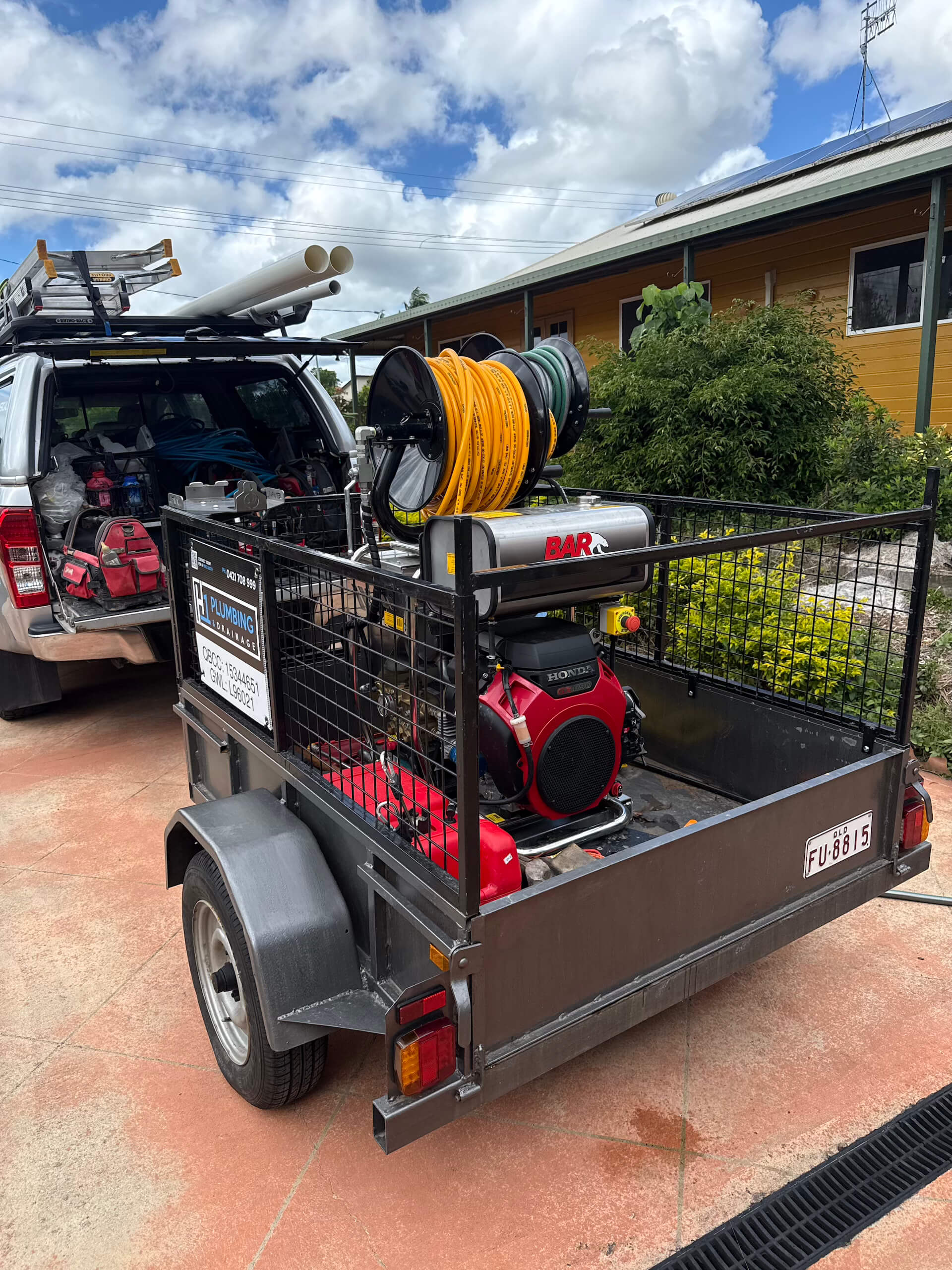High pressure drain jetter trailer used by H1 Plumbing & Drainage to clear sewer blockages